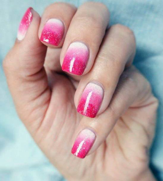 Pink Hued Ombre Nails With Tinges Of White For Women