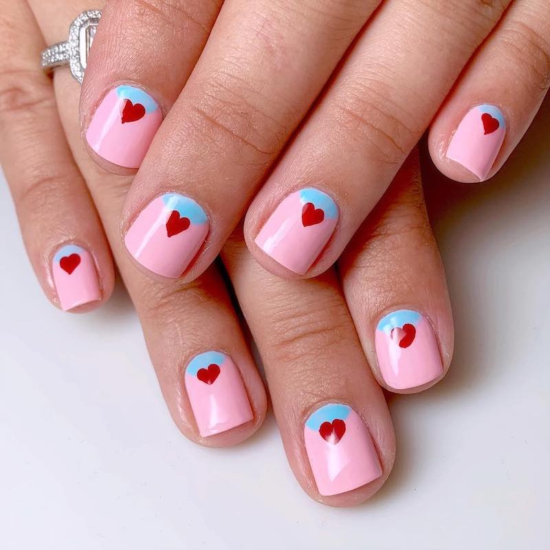 short gel nails with designs of hearts